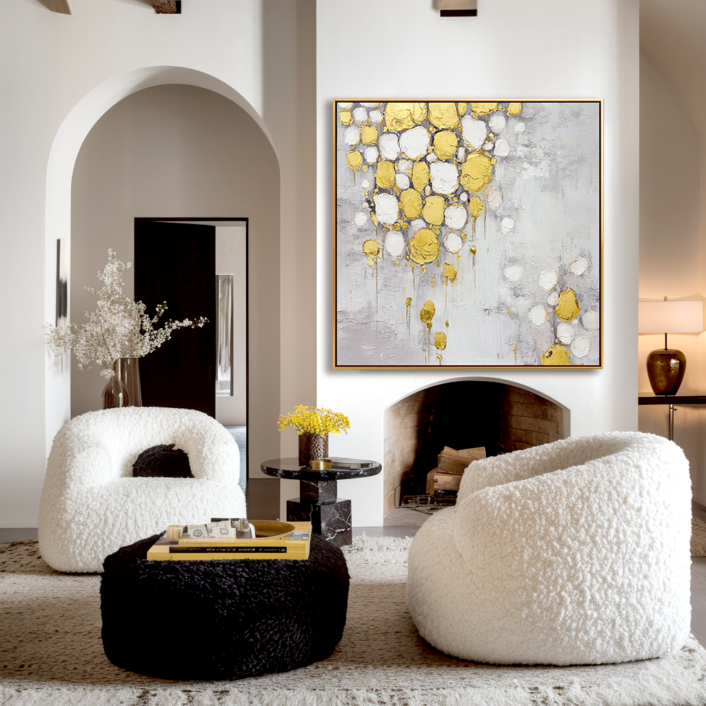 Abstract painting with gold and white textured drops on a soft gray background